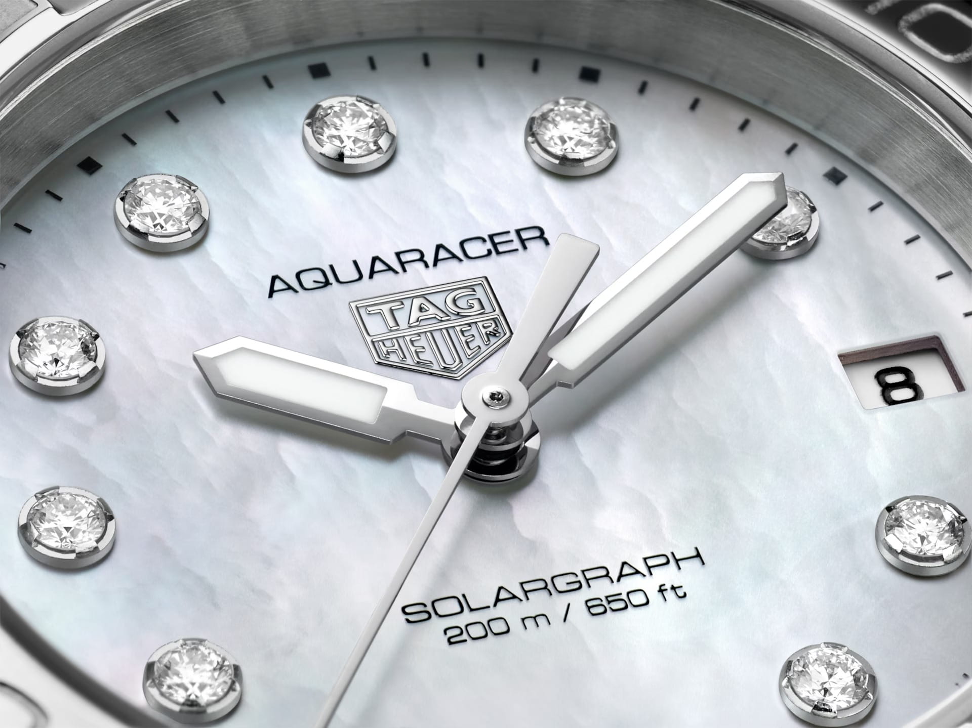 TAG Heuer TAG Heuer Aquaracer Professional Solargraph WBP1313.BA0005 кварцевые женские часы часы крупный план перламутровый циферблата
